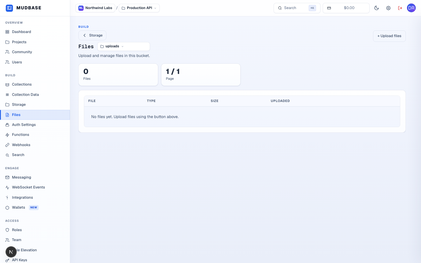 Files page for the uploads bucket, empty, with the bucket switcher and Upload files button marked